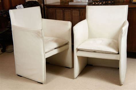 Foldable metal patio chair by emu. Two White Leather Chairs by: Mario Bellini for Cassino ...