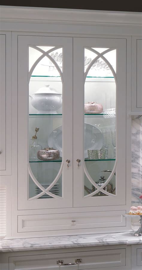 Glass cabinets also create an illusion of depth that makes smaller spaces seem. | PlainFancyCabinetry | Glass kitchen cabinets, Glass ...