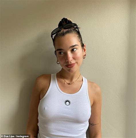 Dua Lipa Poses Braless In A Tight White Tank Top After Revealing Shes
