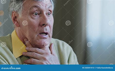 Close Up Portrait Of Sick Mature Elderly Man Coughing Sad Old
