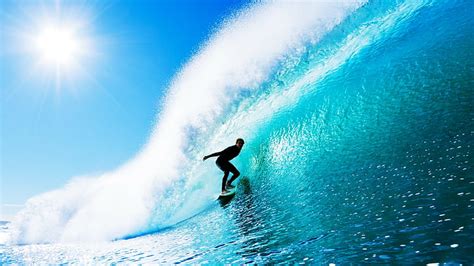 Surfing Man On Big Water Under Blue Sky During Daytime Surfing Man
