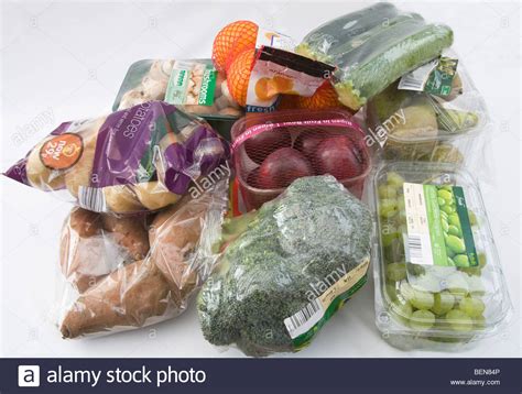 It may bear a nutrition facts label and other information about food being offered for sale. Studio close up Different types of food packaging of fruit ...