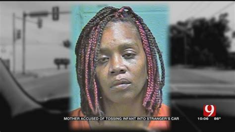 Woman Arrested Accused Of Throwing Baby Into Vehicle