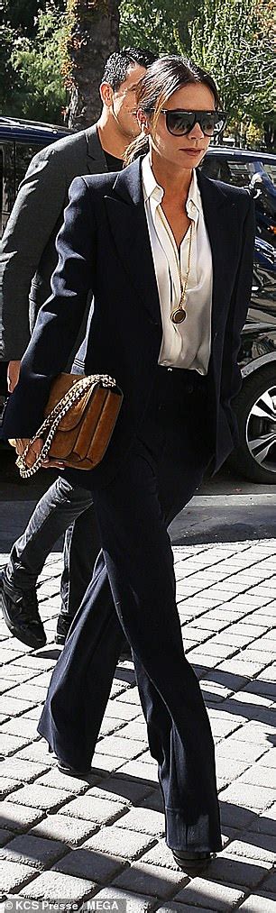 Victoria Beckham Goes Braless In Unbuttoned Blouse In Paris Daily Mail Online