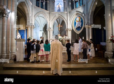 Holy Communion In A French Catholic Church Paris France Stock Photo