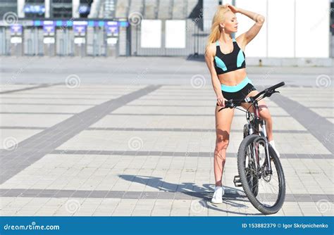 Beautiful Blonde Woman With Long Hair Posing In Outdoor With Bike Stock Image Image Of