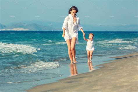 Mother And Daughter Walking On The Stock Photo Containing Child And Kid
