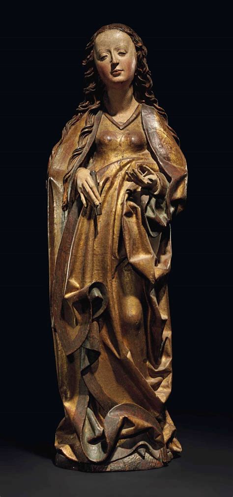 A Parcel Gilt Polychrome Wood Figure Of A Female Saint