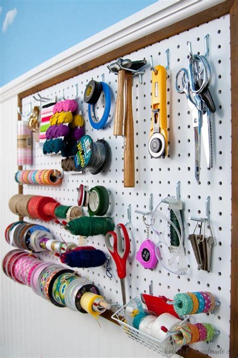 Transform your craft room with an these ikea skadis pegboard decorating ideas. How to Hang Pegboard so it is Removable - a Houseful of ...
