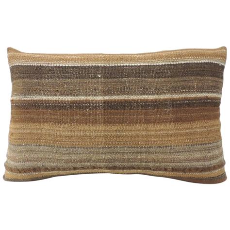The generously oversized drawstring bolster pillow features a solid cocoa brown brushed cotton with subtle pleating details on both sides. 19th Century Saddle Woven Brown Stripe Bolster Pillow For ...