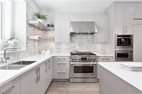 Things to consider when shopping for kitchen cabinets are drawer size, construction, wood type and the finish. Excellent Kitchen Cabinets, Surrey | Award-Winning Design
