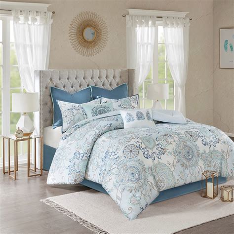 I bought it along with the tamiko pintuck duvet cover set in a king as well and they work just fine together. Isla Blue by Madison Park - BeddingSuperStore.com