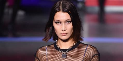 Bella Hadid Shows Off Platinum Blonde Hair In Tight Curls For New