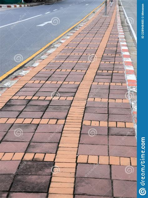 Old Color Long Paved Brick Footpath Brick Path Or Sidewalk With