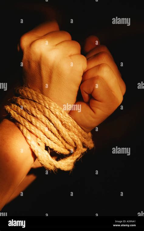 Hands Tied Wrists Rope Hi Res Stock Photography And Images Alamy