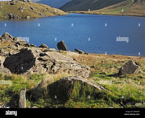 Spectacular Landscape With Rocks Looking Over Small Water En Route From