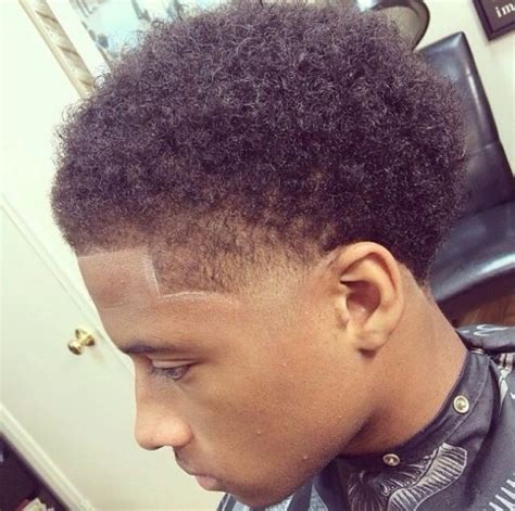Whether you're a white, black, latino, or asian guy, the taper fade haircut is a warm and sexy hairstyle for guys. 70 Kicky High & Low Taper Fade Haircuts for Black Guys