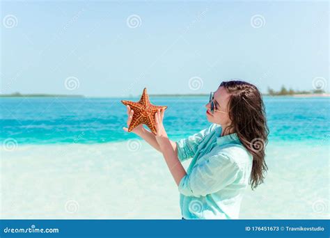 Adorable Girl With Starfish On The Beach Stock Image Image Of Natural Caucasian