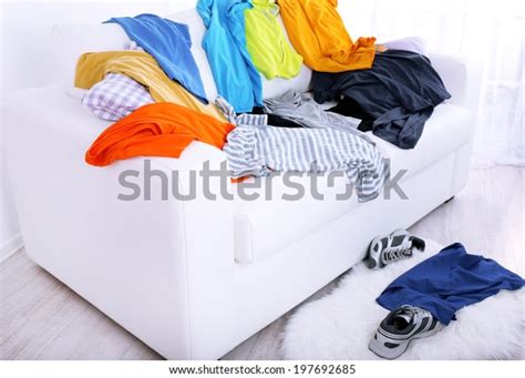 Messy Colorful Male Clothing On Sofa Stock Photo 197692685 Shutterstock