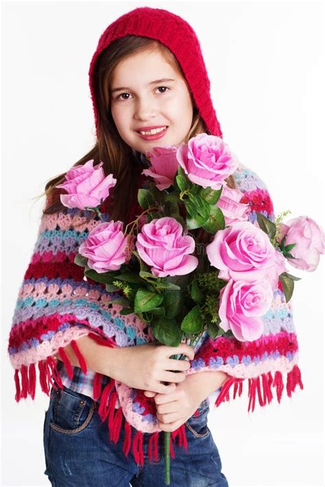 Little Girl Holding A Bouquet Of Red Roses Stock Photo Image Of Jeans