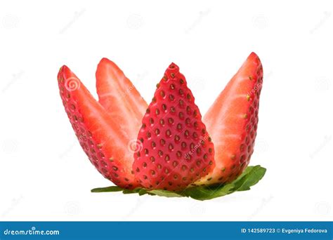 Fresh Strawberry With Green Leaves Cut Into Quarters Stock Image