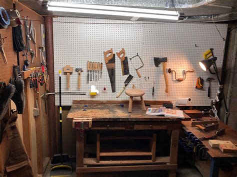 Basement workshop, bench from previous owner, gradually building toolkit. : Workbenches