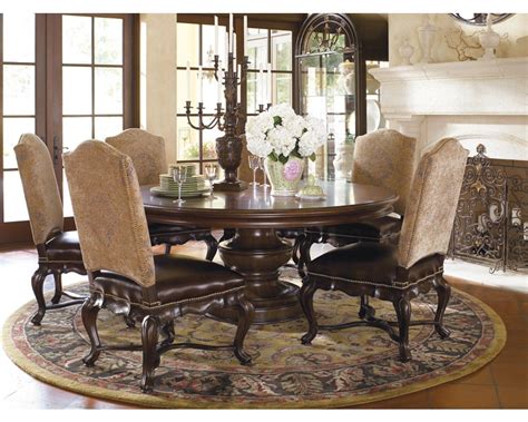 This innovative table is accented with beveled glass and a unique geometrical base design which will become the focal point of any dining area. Elba Round Dining Table - Dining Tables - Dining Room ...