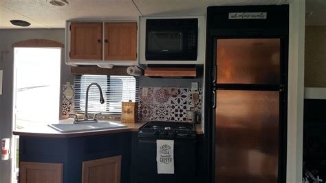 This post may contain affiliate links, meaning, if you click through and make a purchase we may earn a we recently bought a 2008 travel trailer and i immediately started removing all the things i didn't like…including the upper kitchen cabinets. #camperrevampers.com (With images) | Rv stuff, Kitchen ...