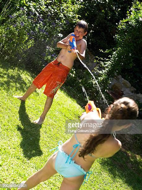 Two Girls Squirting Bildbanksfoton Och Bilder Getty Images