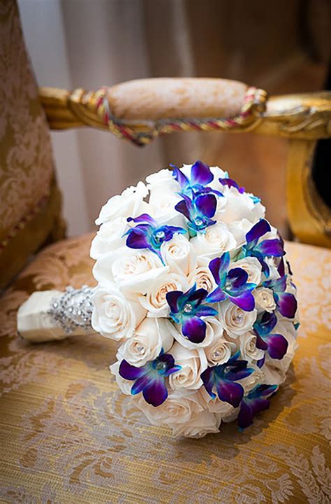 Combine dark purple and burgundy blooms with contrasting white and pink flowers for a bouquet that's dramatic yet soft. Wedding ideas by colour: Blue and purple wedding theme ...