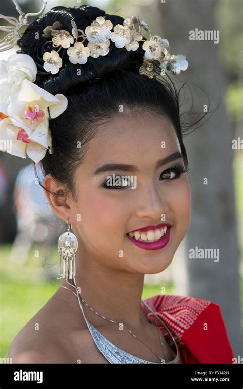 thai girl posing wearing traditional clothes from indigenous people of photos