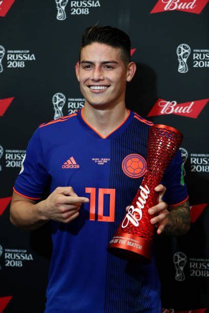 James Rodriguez Of Colombia Poses With His Man Of The Match Trophy