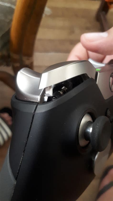 My Elite Controllers Lb Button Popped Out And Dont Know How To Fix It