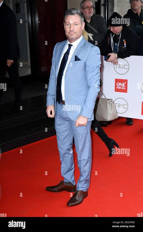 dean gaffney arriving at the tric awards grovesnor house hotel london picture credit should