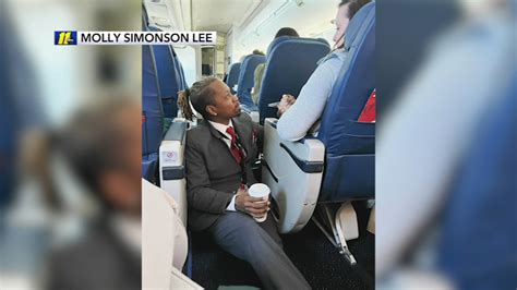 raleigh woman captures moment flight attendant consoles passenger during turbulence abc11