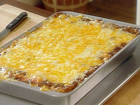 Spray a large piece of aluminum foil with nonstick cooking spray, and cover lasagna, spray side down. The Lady and Sons Lasagna Recipe : Paula Deen : Food ...
