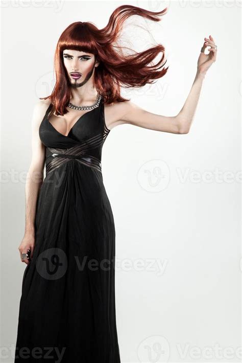 Sensual Shemale Model With Makeup And Red Color Hair In Studio Stock Photo At Vecteezy