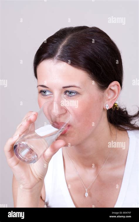 Woman Drinking Water Stock Photo Alamy