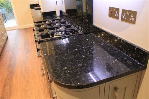 This stone also comes in an array of colors and. Emerald Pearl granite kitchen worktops with upstands and ...