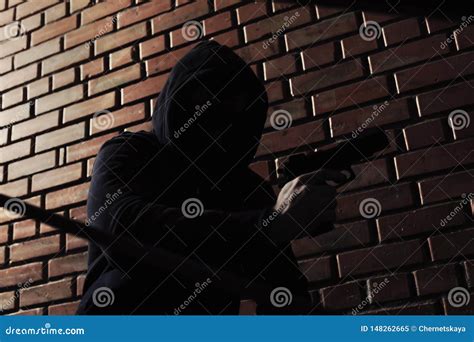 Man In Hoodie With Gun Dangerous Criminal Stock Image Image Of Home