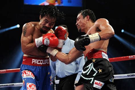 Pacquiao Vs Marquez Results Manny Pacquiao Squeaks By Juan Manuel