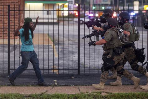 Photos Capture The Tension Between Police And Protestors In Ferguson Time