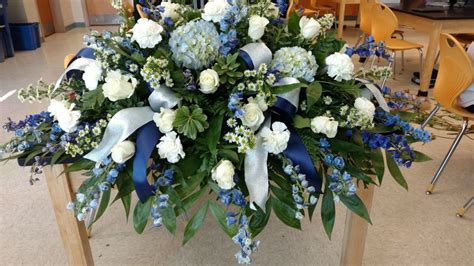 Blue White Silver Casket Spray Funeral Flowers With Hydrangeas