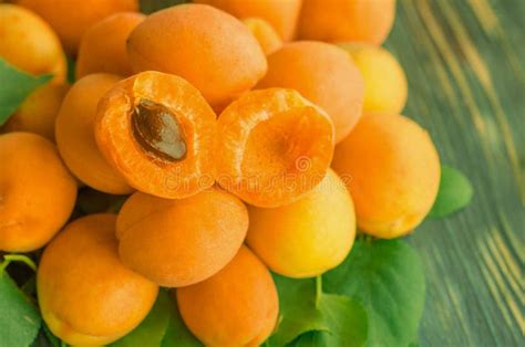 Ripe Apricots And Apricot Leaves On The Wood Stock Image Image Of