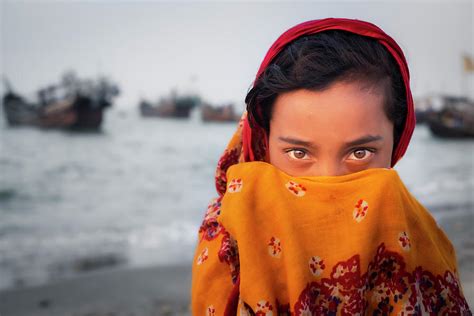 Asian Girl Covered Face And Bright Eyes Photograph By Robert Pastryk