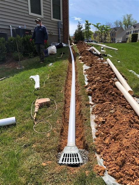 Exterior Drainage Solutions In Clarksburg Md Burying Downspouts