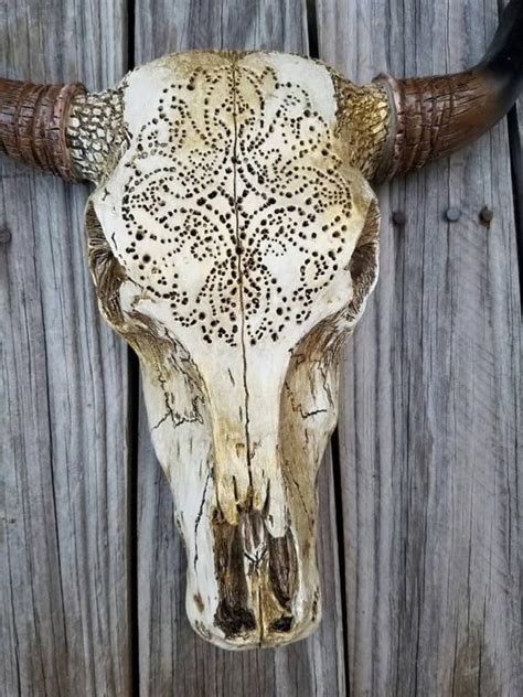 Cow skull decor skull art deer skulls animal skulls cool succulents painted cow skulls antler crafts buffalo this cow skull is decorated with silk succulents for a bright fresh look all year long. Western skull decor, drilled bull skull for western decor ...