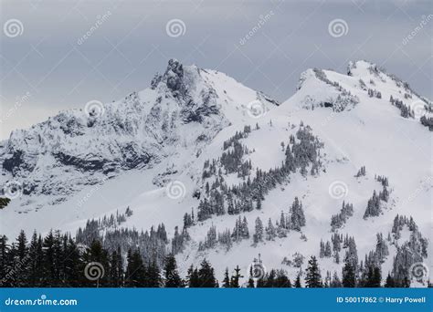 Mt Rainier Low Snow Fall On Near By Peaks Stock Photo Image Of Blue