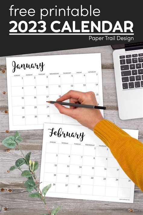 A Person Writing On A Calendar With The Text Free Printable 2013