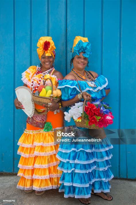 Two Cuban Ladies In Traditional Costume Placa De Les Armas Havana Stock